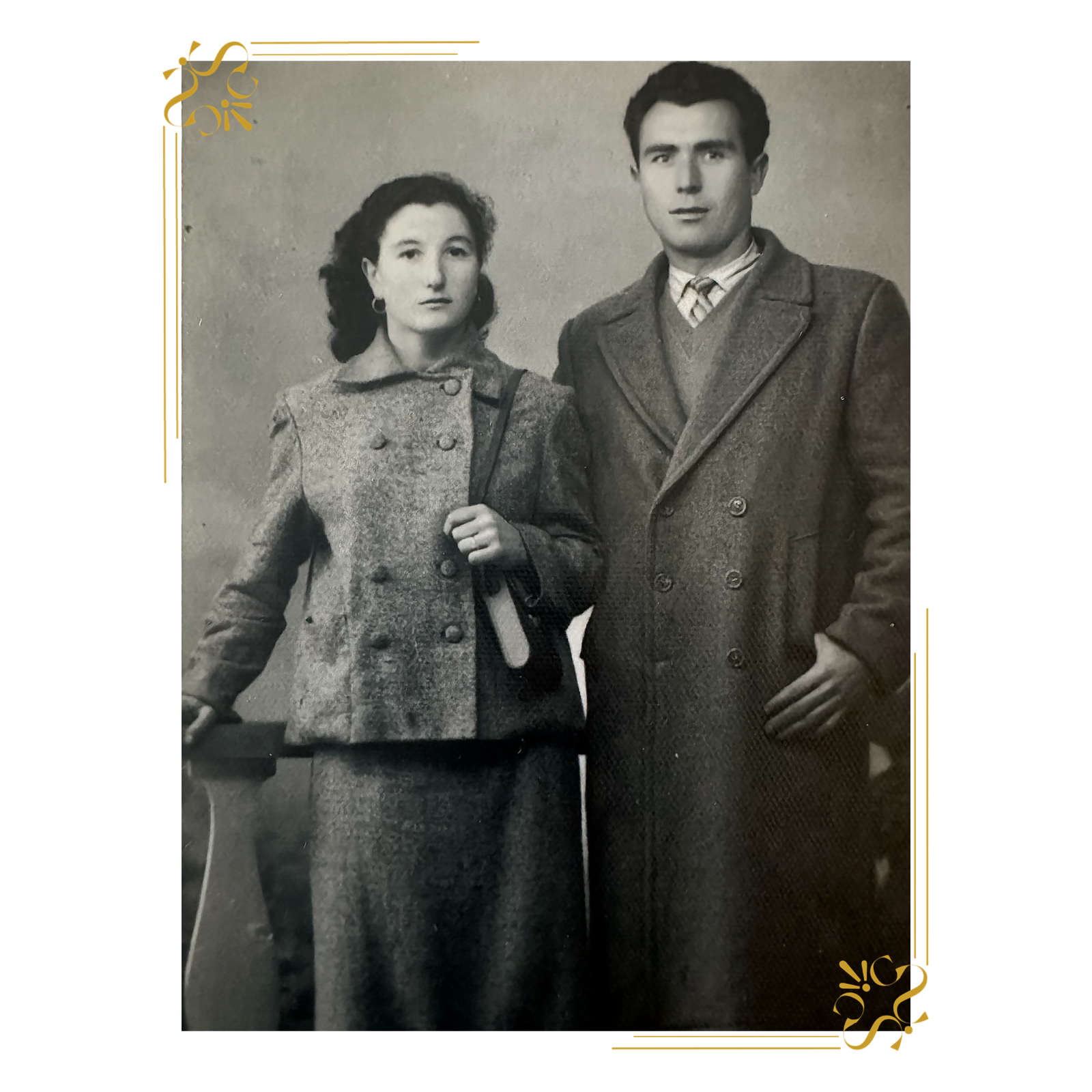 Vintage black and white portrait of Iannetelli’s Nonno and Nonna, dressed in classic coats, honoring Italian family heritage.